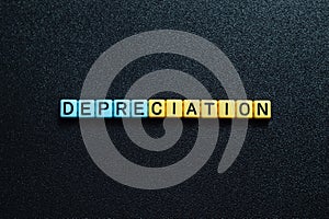 Depreciation - word concept on cubes