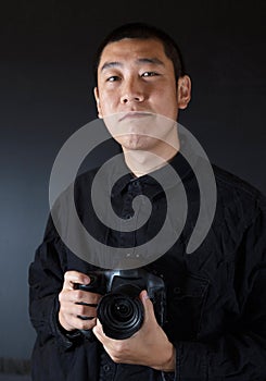 Depress asian photographer