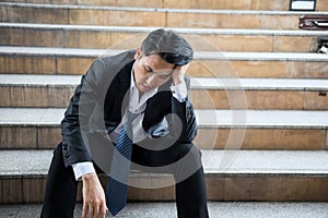 Depress fired businessman headache at city