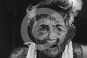 Depress and helpless elderly woman, grandma sitting outdoor wait