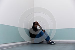 Depressed Man Sitting On Floor