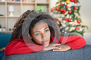 Depressed afro american woman on christmas holiday