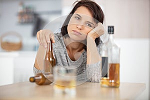 depressed alcoholic young beautiful woman photo