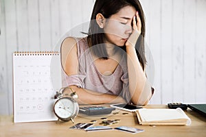 Depressed Asian woman having problem bankruptcy, credit card debt