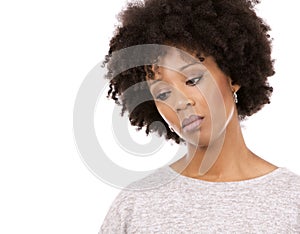 Depressed black casual woman on white background