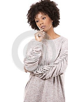 Depressed black casual woman on white background