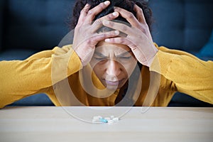 Depressed black woman portrait suffering for addiction