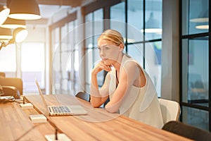 Depressed business blonde woman having troubles with her works