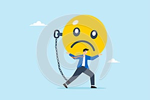 Depressed businessman carries burdened sad face with heavy chain, illustrating weighed down by stress, anxiety, negative emotions