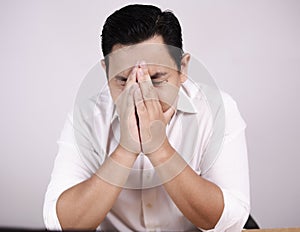 Depressed Bussinesman Covering His Face