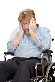 Depressed Disabled Man In Wheelchair