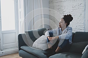 Depressed and distressed african american woman feeling lonely, sad and exhausted