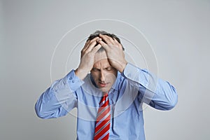 Depressed Entrepreneur Isolated Over Grey Background