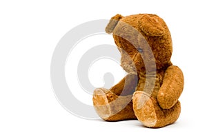 Depressed lonely old teddy isolated