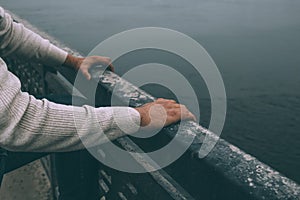 Depressed man is going to jump from bridge. Suicide concept