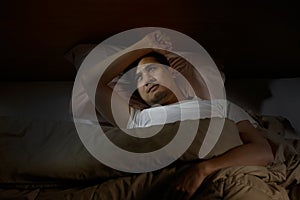 Depressed man suffering from insomnia