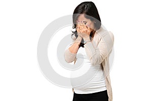 Depressed pregnant woman feeling down and crying