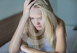 Depressed sad woman in her bed.  Health problems