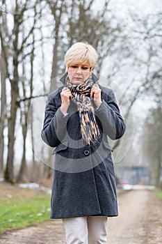 Depressed or sad woman walking in winter