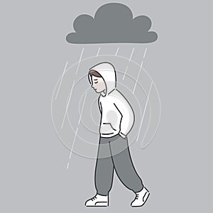 Depressed teenage boy walking under rain