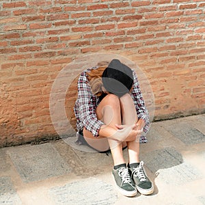 Depressed teenage woman feeling sad and lonely.