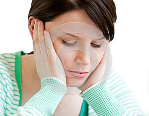 Depressed teenager holding up her head on her hand