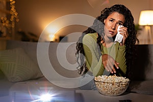Depressed Woman Crying Watching Sad Movie Wiping Tears At Home