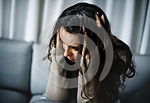 Depressed woman having a counseling session photo