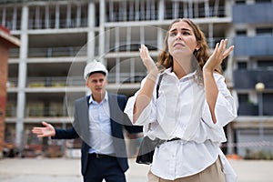 Depressed woman having problems at construction site