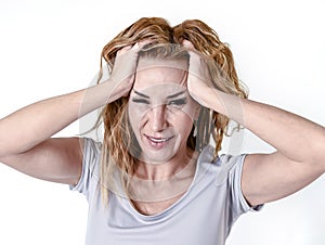 Depressed woman looking desperate in pain face expression suffering migraine and headache