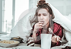 Depressed woman is overeating because of stress