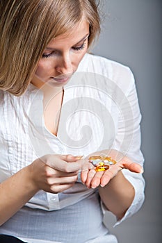 Depressed woman with pharmaceutical