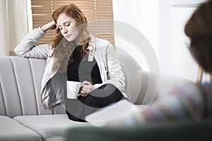 Depressed woman during psychotherapy