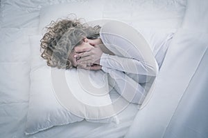 Depressed woman sleeping all day