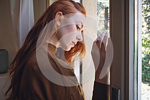 Depressed woman suffering seasonal depression, feeling blue