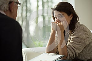 Depressed women listen her therapist