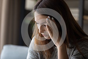 Depressed young caucasian woman having psychological problems.