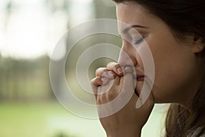 Depressed young woman crying