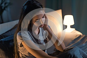 Depressed young woman suffering from insomnia