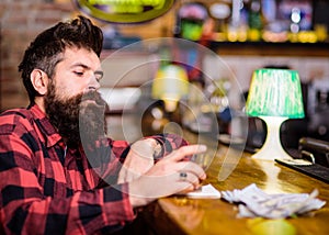 Depression and alcoholism concept. Man with sad face sit alone