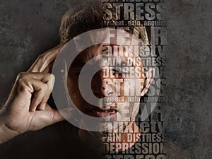 Depression composite with words like pain and anxiety composed into face of young sad man suffering stress and headache feeling photo