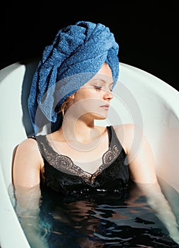 Depression concept. Sad woman in bath. Sadness, fatigue or grief, frustration. Alone upset girl.