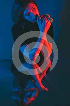 depression disorder neon portrait sad woman dark