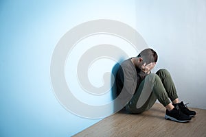 Depression man sit on floor