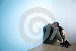 Depression man sit on floor