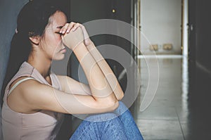 Depression young girl teenager having abused problem feeling suffering sitting alone in the dark room, Domestic violence,