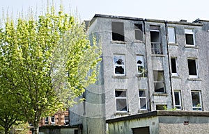 Derelict abandoned council house in poor housing crisis ghetto estate slum in North England