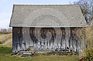 Derelict barn with rotted planks