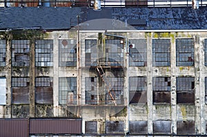 Derelict building with broken windows.