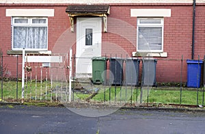 Derelict council house in poor housing estate slum with many social welfare issues in Port Glasgow